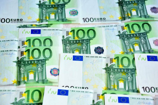 View,Of,Euro,Coins,And,Banknotes,On,The,Table