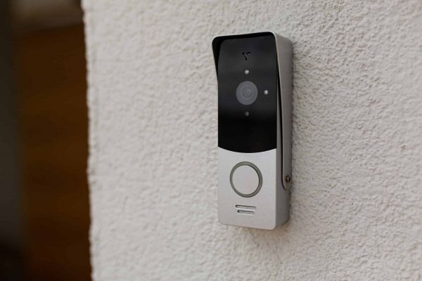 Doorbell,On,The,Wall,Of,The,House,With,A,Surveillance