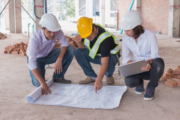 Consultant,Engineer,Discussing,Construction,Project,In,Blueprint;,Consulting,Concept,In