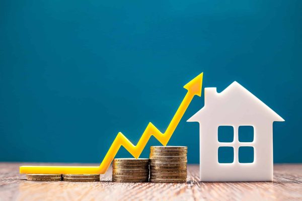 Real,Estate,Market,,Graph,,Up,Arrow.,House,Model,And,A