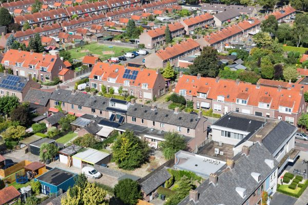 Aerial,View,Family,Houses,With,Backyards,In,Residential,Area,Of