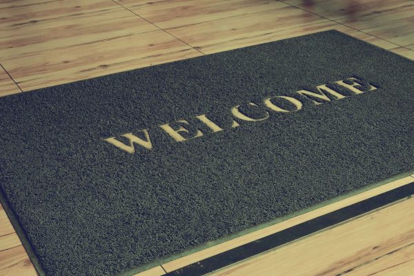 Big,Welcome,Mat,On,Floor.